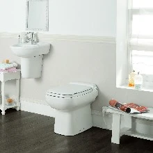Sanibroyeur C3SENL SFA Sanicompact Luxe staand toilet met ingebouwde vergruizer - met zitting - wit